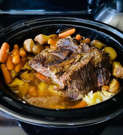 Pot roast, carrots and potatos in a crockpot