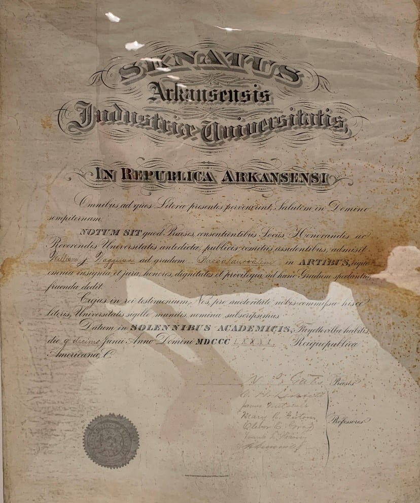 A yellowed historical diploma titled 