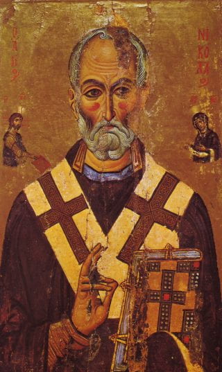 An illustrated portrait of a man in dark robes and a white cloth over his shoulders with red crosses on each side. The man has white hair and beard. He is holding a book with a cross on it and there are two small figures, one above each of his shoulders, praying.