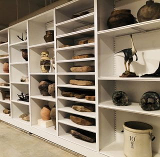 Shelves containing artifacts